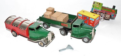 Lot 853 - A small group of 2 Minic tinplate trucks,...