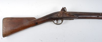 Lot 2286 - An early 19th century flintlock rifle, having...
