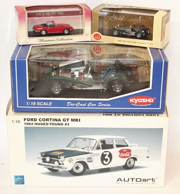 Lot 2418 - A group of 4 models two are in 1:18 scale...