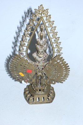 Lot 18 - An Indian brass model of a Hindu deity in...