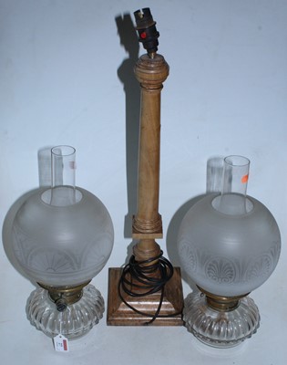 Lot 27 - A pair of cut clear glass oil lamp fonts with...