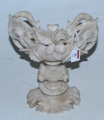 Lot 53 - An alabaster boat shaped table centrepiece...