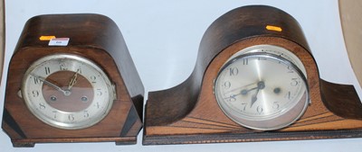 Lot 66 - An Art Deco oak cased mantel clock having a...