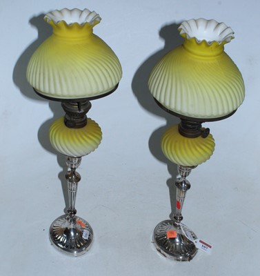 Lot 107 - A pair of late Victorian silver candle sticks,...