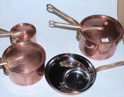 Lot 111 - A graduated set of three copper saucepans and...