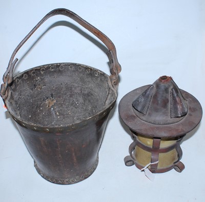 Lot 115 - An early 20th century leather fire bucket with...