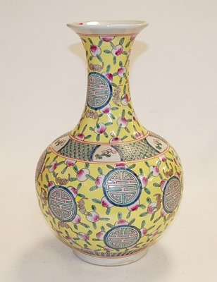 Lot 140 - A reproduction Chinese vase having a flared...
