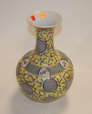 Lot 140 - A reproduction Chinese vase having a flared...