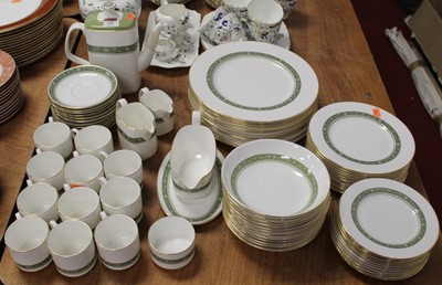 Lot 151 - A Royal Doulton part dinner and tea service in...