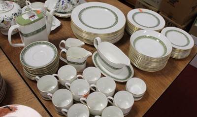 Lot 151 - A Royal Doulton part dinner and tea service in...