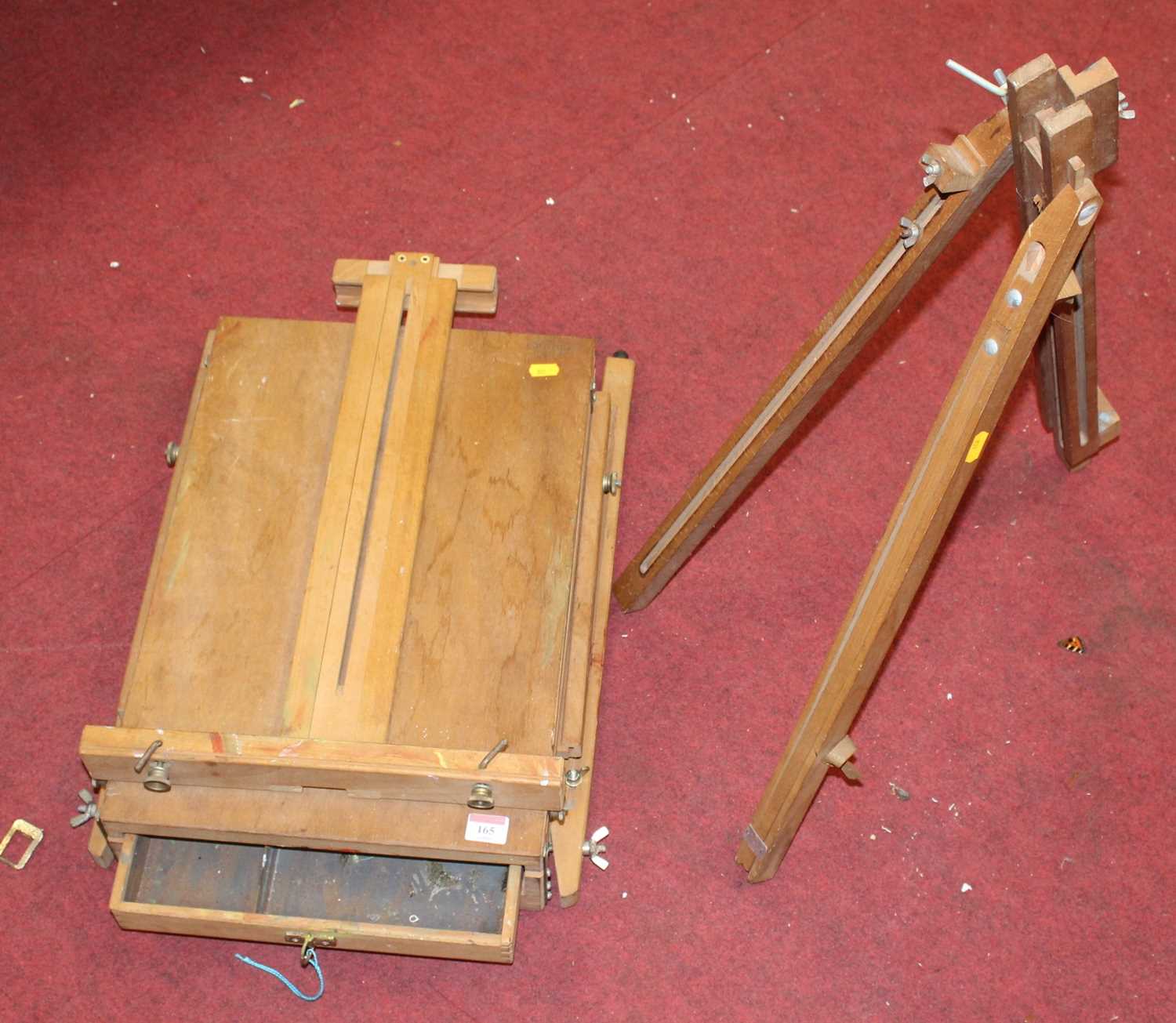 Lot 165 - A folding artist's easel and box
