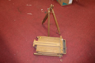 Lot 165 - A folding artist's easel and box
