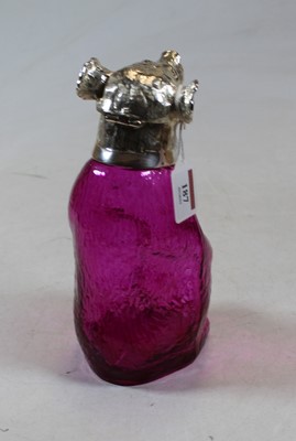Lot 187 - A contemporary novelty claret jug in the form...