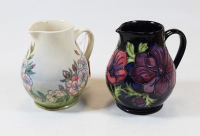Lot 190 - A Moorcroft pottery jug in the Anenome pattern...