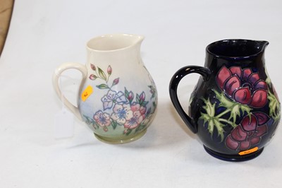 Lot 190 - A Moorcroft pottery jug in the Anenome pattern...