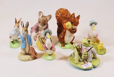 Lot 214 - A collection of seven Beswick Beatrix Potter...