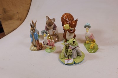 Lot 214 - A collection of seven Beswick Beatrix Potter...