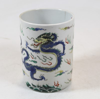 Lot 220 - A Chinese stoneware brush pot, enamel...