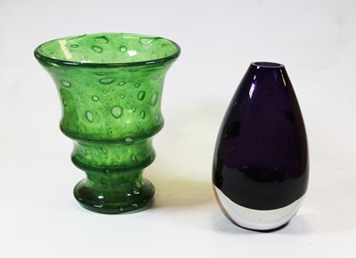 Lot 221 - An amethyst tinted studio glass vase of tear...