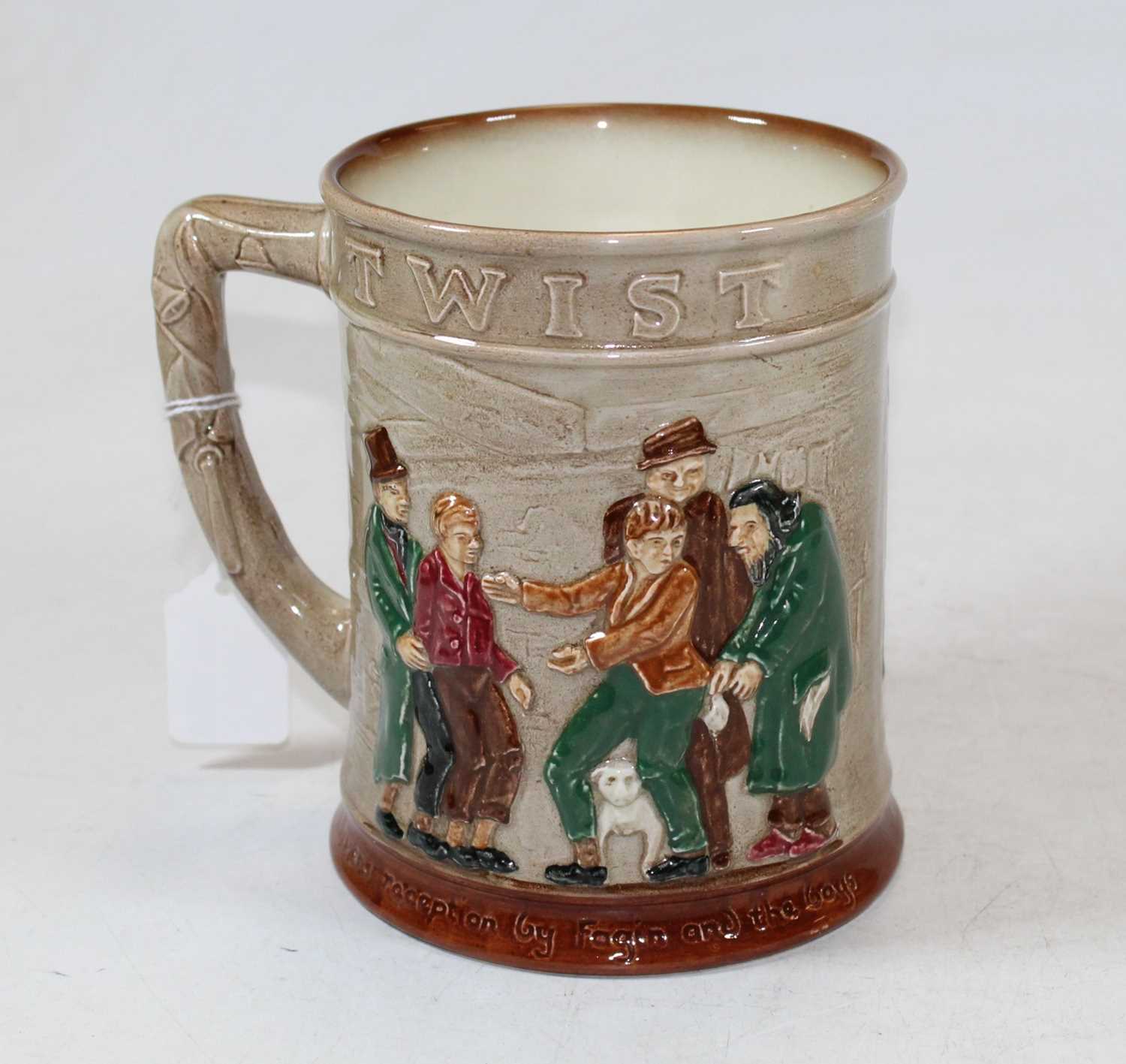 Lot 226 - A Royal Doulton Oliver Twist tankard, having...