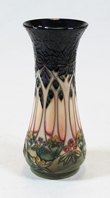 Lot 232 - A Moorcroft Pottery vase in the Cluny pattern,...