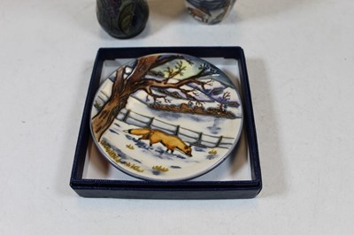Lot 238 - A small Moorcroft pottery dish typically...