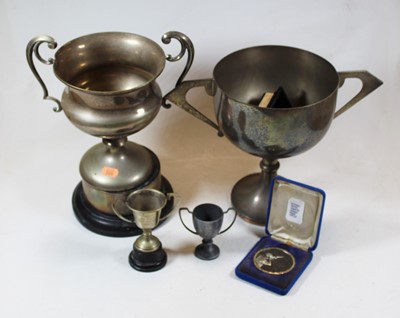 Lot 282 - A silver plated twin handled trophy cup for...