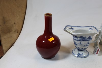 Lot 239 - A Chinese stoneware flambe glazed bottle vase,...
