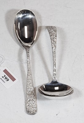 Lot 299 - A small sterling silver ladle, the stem...