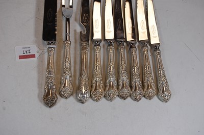 Lot 237 - A set of six knives, each steel blade marked...