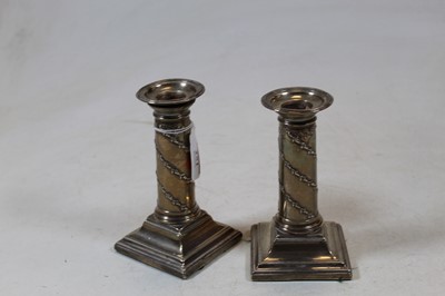 Lot 251 - A pair of late Victorian silver candlesticks,...
