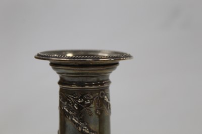 Lot 251 - A pair of late Victorian silver candlesticks,...