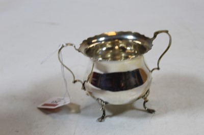 Lot 253 - An Edwardian silver twin handled sugar bowl of...