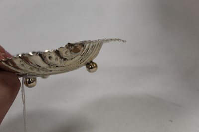 Lot 255 - A late Victorian silver shell shaped butter...