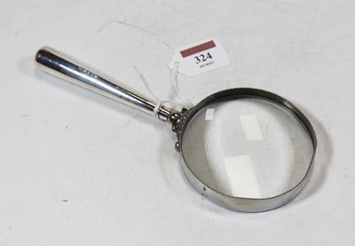 Lot 324 - An oversize magnifying glass, the circular...