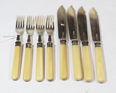 Lot 338 - A set of four Edwardian silver fish forks;...