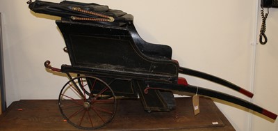 Lot 1465 - A Victorian child's bath type chair, having...