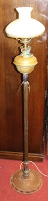 Lot 1469 - An early 20th century brass standard lamp with...