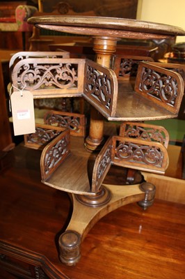 Lot 1407 - A Victorian faded mahogany circular two-tier...