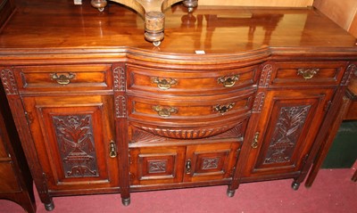 Lot 1408 - An Edwardian relief carved walnut sideboard,...