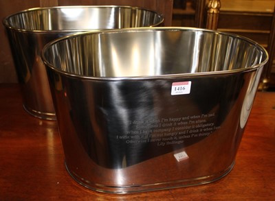 Lot 1416 - A pair of contemporary polished oval champagne...