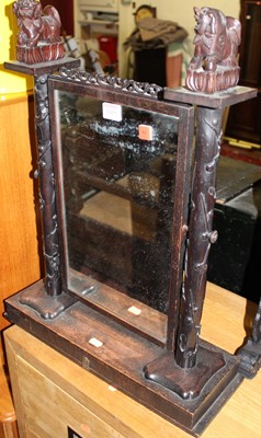 Lot 1419 - A Chinese stained and carved hardwood swing...