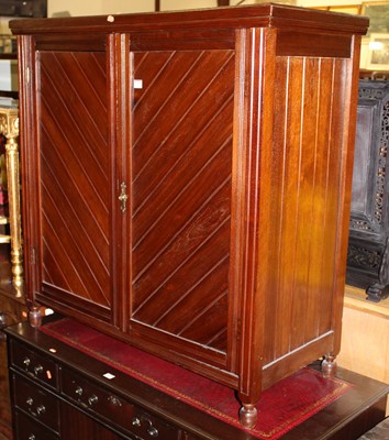 Lot 1427 - An Edwardian walnut double door side cupboard,...