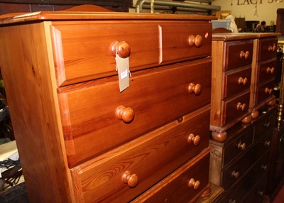 Lot 1432 - A modern pine ledgeback chest of four long...