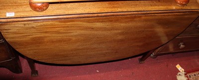 Lot 1433 - A 19th century mahogany drop leaf dining table,...