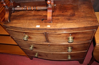Lot 1435 - An early 19th century mahogany bow front chest...