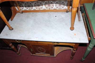 Lot 1443 - A late Victorian light oak white marble top...