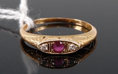 Lot 373 - An early 20th century yellow metal, ruby and...