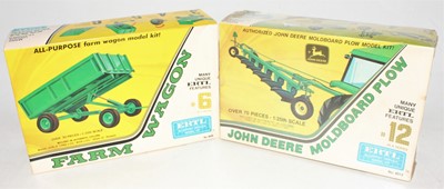 Lot 727 - A group of two boxed Ertl farm kits as follows:...