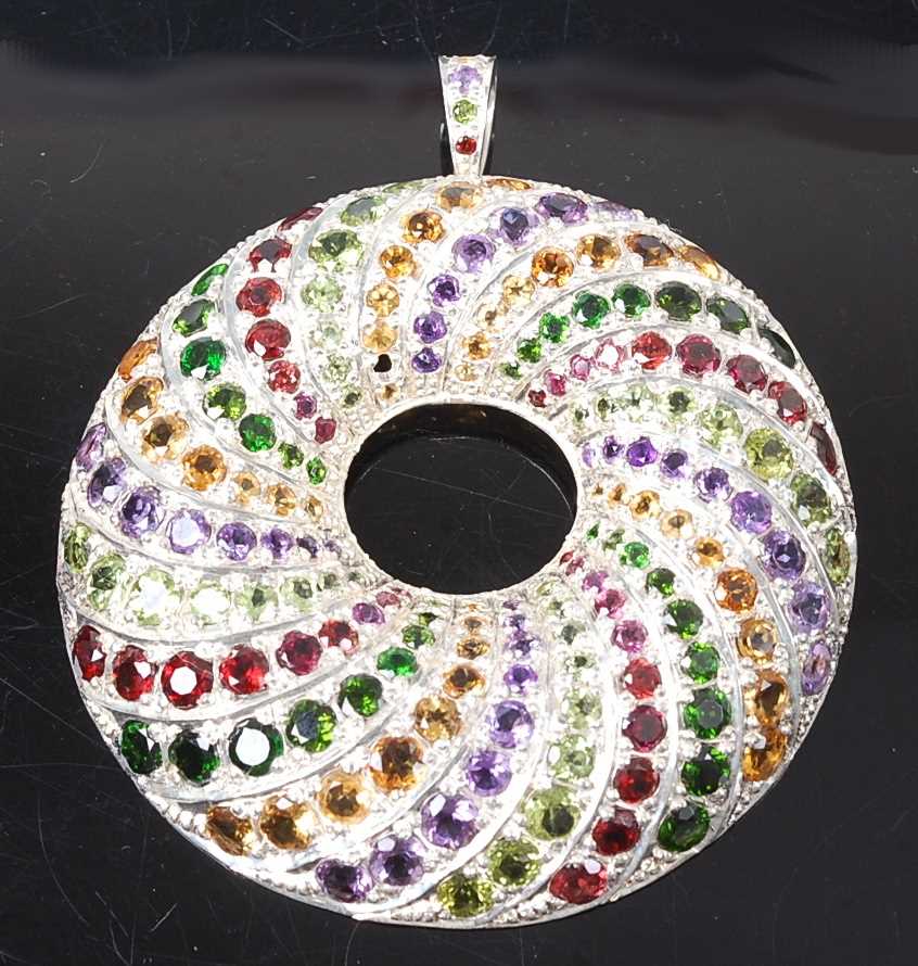 Lot 2628 - A sterling silver multi-stone large circular...